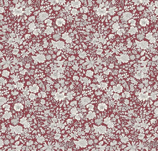 White floral pattern on a red background