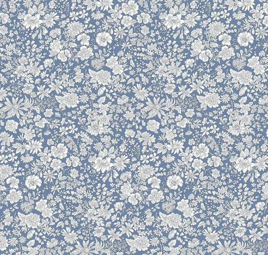 Floral pattern with white flowers on a blue background