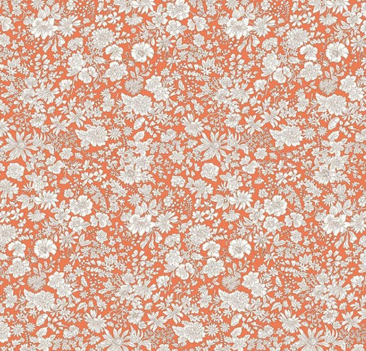 Floral pattern with white flowers on a coral background