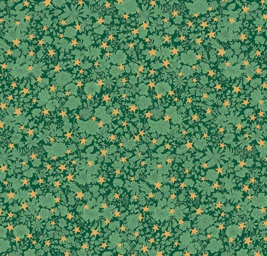Pine green Christmas fabric with metallic gold star pattern from Liberty Fabrics.