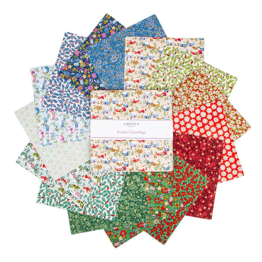 Liberty Fabrics Festive Greetings 10-inch Stacker with 42 Christmas-themed quilting cotton squares.