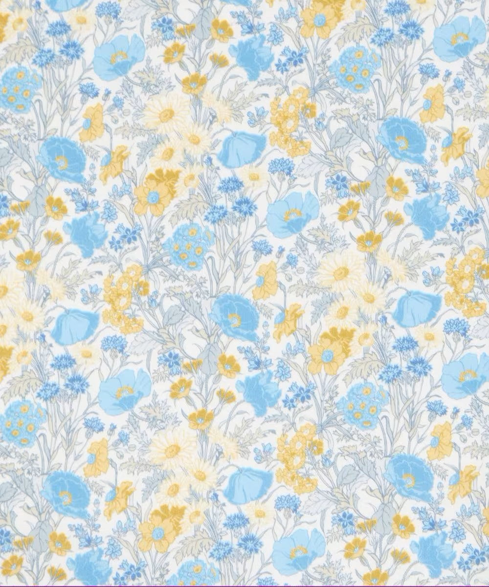 Floral pattern with blue and yellow flowers on a white background