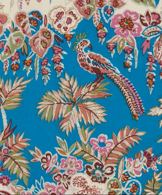 Colorful floral and bird pattern on a blue background
