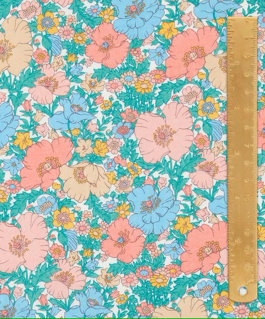 Floral patterned paper with a ruler for scale