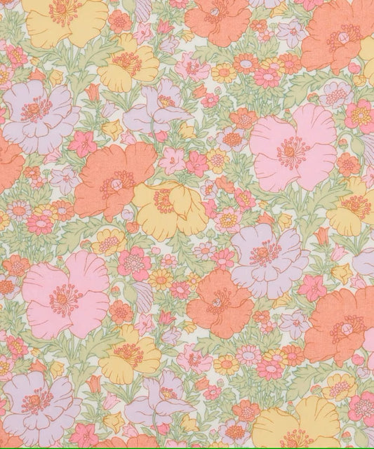 Pastel floral pattern with pink, yellow, and orange flowers on a green background