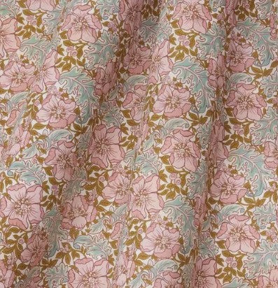 Floral patterned fabric with pink, green, and brown colors.