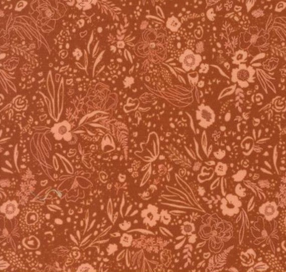 Floral pattern on a red-brown background