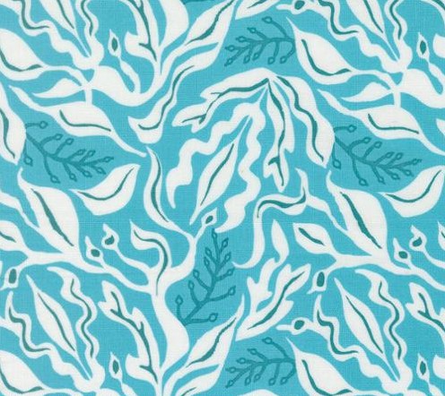 Pattern of white leaves on a blue background