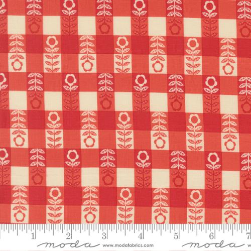Red and beige checkered fabric pattern with floral designs, featuring Moda label.