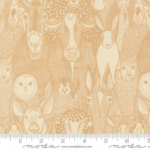 Fabric pattern with animals and a ruler for scale, featuring the brand 'Moda'.