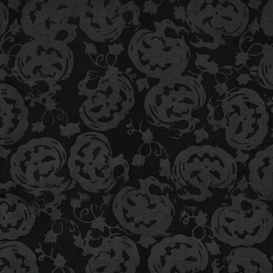 Island Batik Boo Bash Jack O Lantern quilting fabric in Black, a hand-dyed Halloween batik