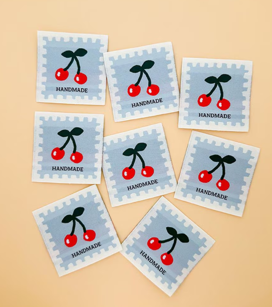 Minki Kim Cherry Blue woven labels by Riley Blake for quilts and bags