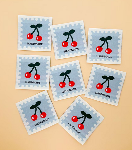 Minki Kim Cherry Blue woven labels by Riley Blake for quilts and bags