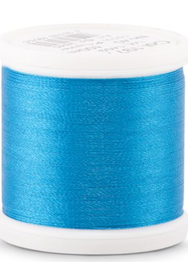 Spool of Madeira Polyneon 40wt thread in Sapphire, color 1977