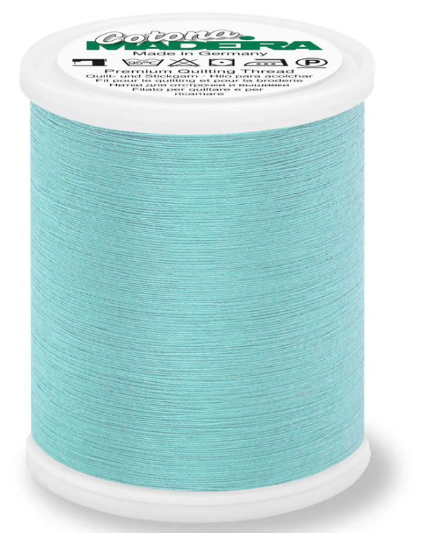 Spool of Madeira Cotona 50wt 100% cotton thread in Ocean Blue, color 632