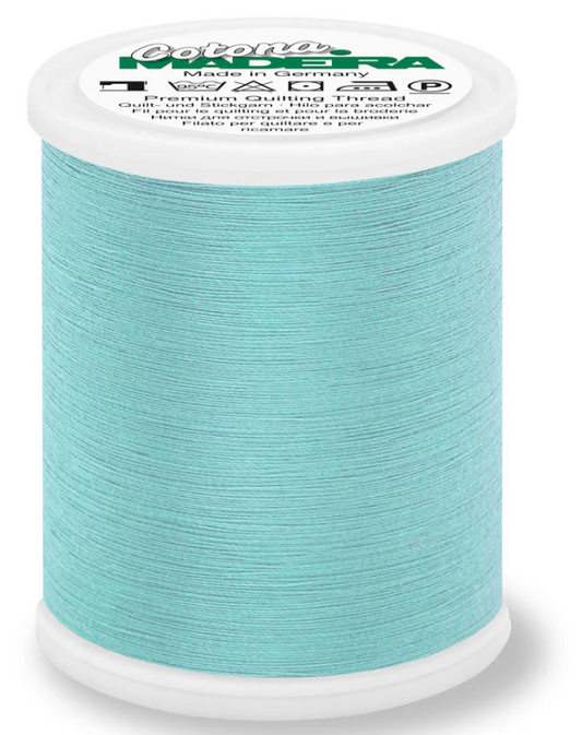 Spool of Madeira Cotona 50wt 100% cotton thread in Ocean Blue, color 632