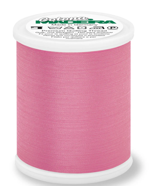 Spool of Madeira Cotona 50wt thread in Pink, color 605