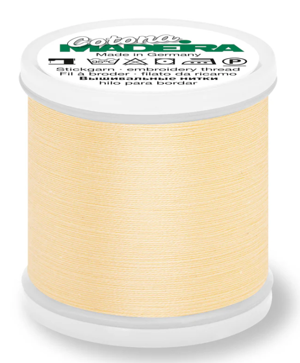 Spool of Madeira Cotona 80wt 100% cotton thread in Pale Yellow, color 610
