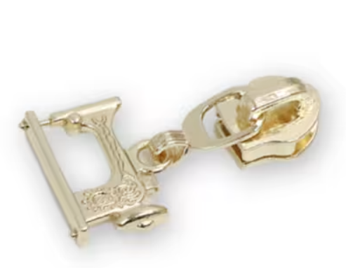 Four 5 sewing machine zipper pulls in gold finish