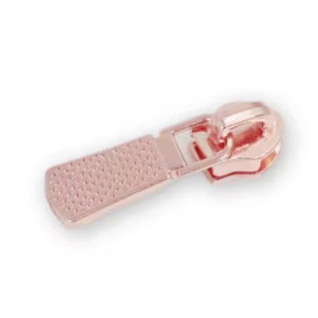 Four 5 textured rose gold zipper pulls for bag making