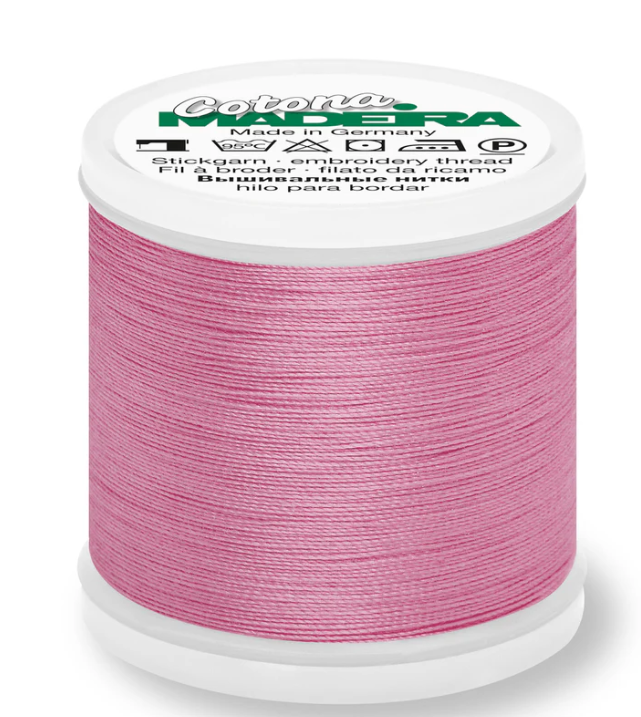 Spool of Madeira Cotona 30wt thread in Pink, color 605