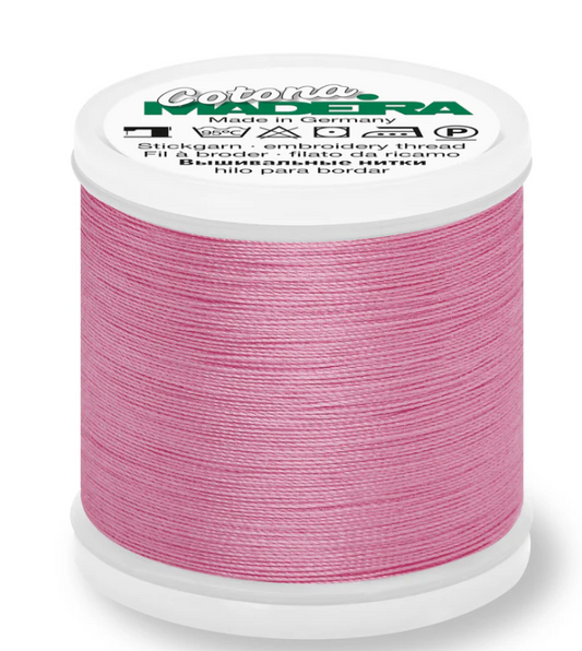 Spool of Madeira Cotona 30wt thread in Pink, color 605