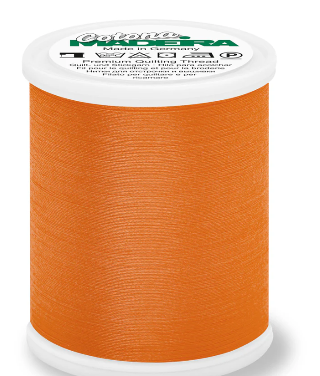 Spool of Madeira Cotona 50wt thread in Orange, color 604