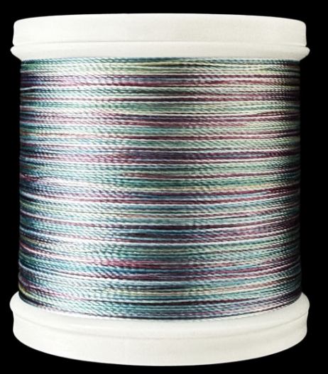 Spool of Madeira Polyneon 40wt thread in Rainbow, color 1606