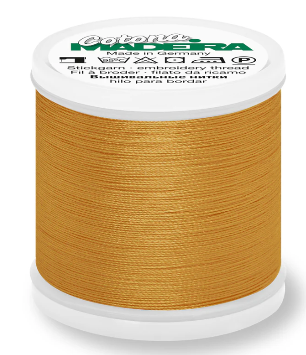 Spool of Madeira Cotona 30wt thread in Orange Sunrise, color 760