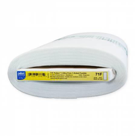 Roll of Pellon Ultra Firm fusible web on a white background