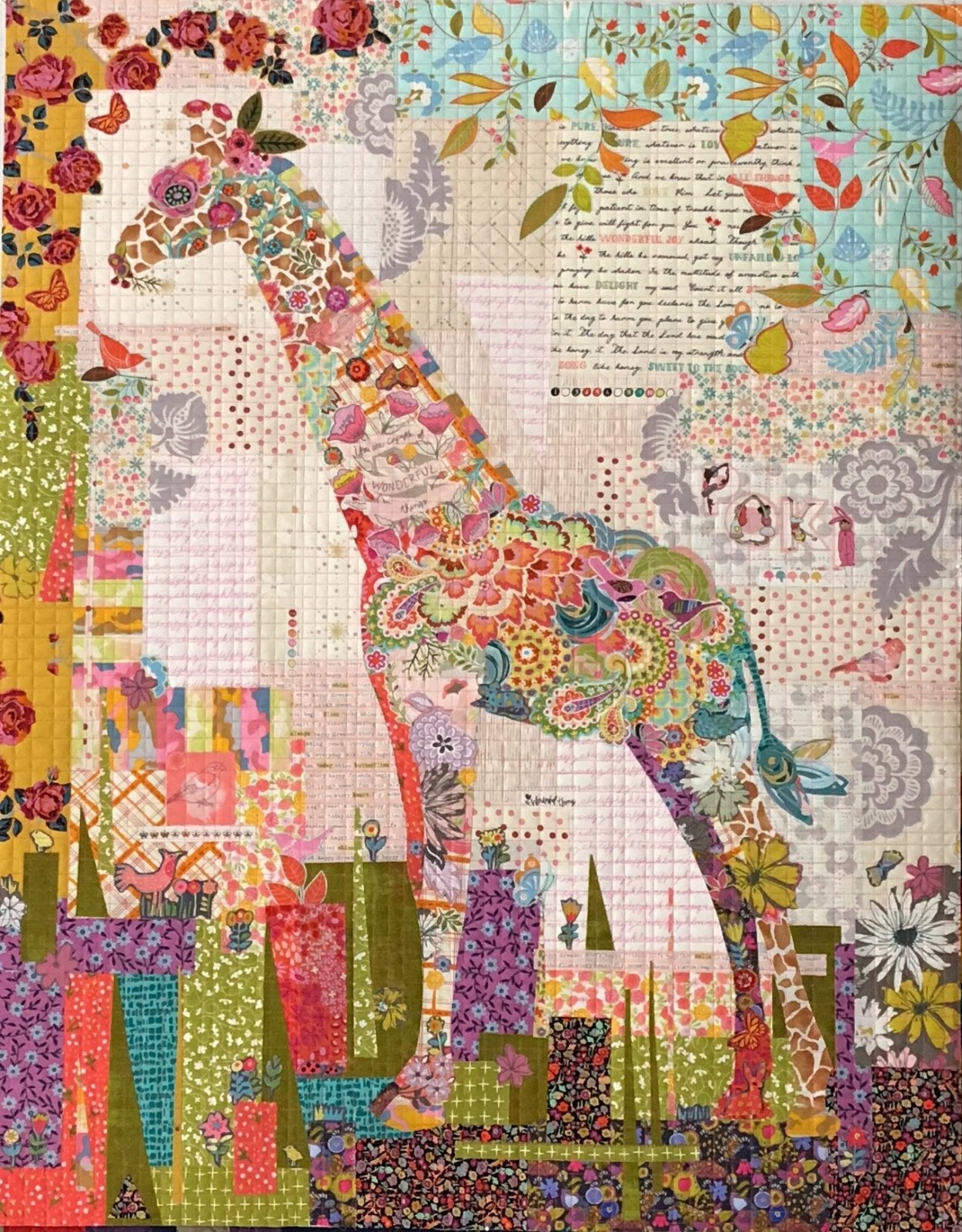 Poki mini collage quilt pattern by Laura Heine featuring giraffe design in fused appliqué collage