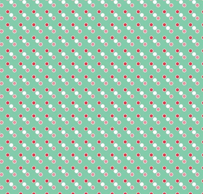Mint green Christmas fabric with white geometric dot design from Riley Blake’s Cozy Christmas collection.