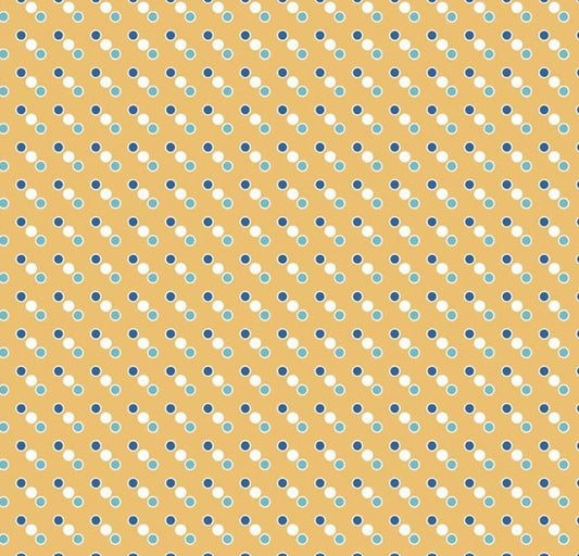 Yellow Christmas fabric with white geometric dot pattern from Riley Blake’s Cozy Christmas collection.