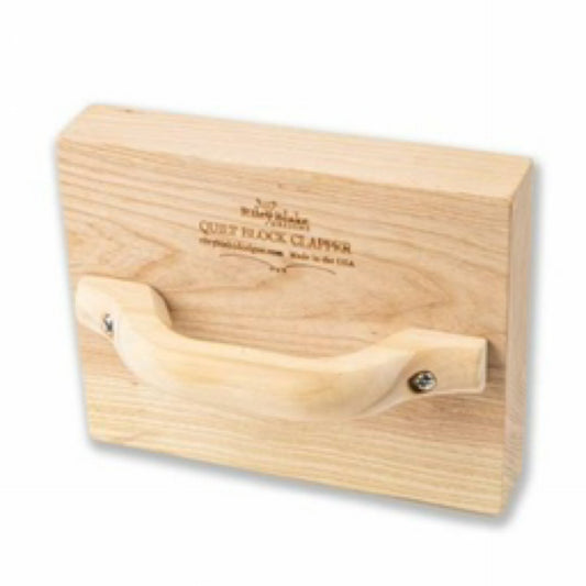 Wooden block clipper on a white background