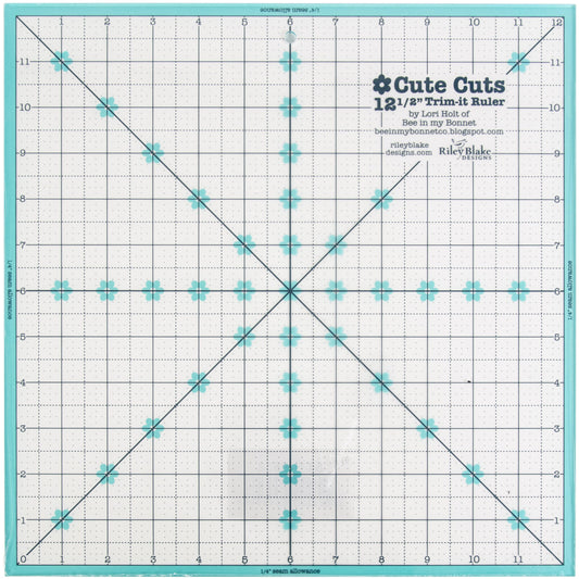 Cute Cuts trim-it ruler with grid lines and measurements on a white background