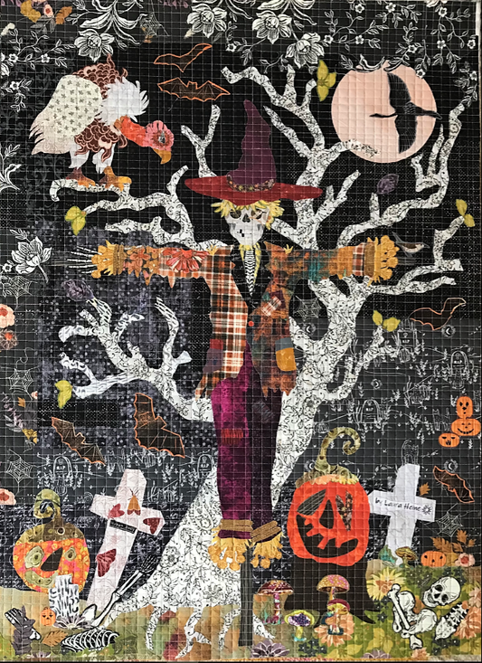Scarecrow collage quilt kit by Laura Heine featuring whimsical fall scarecrow design