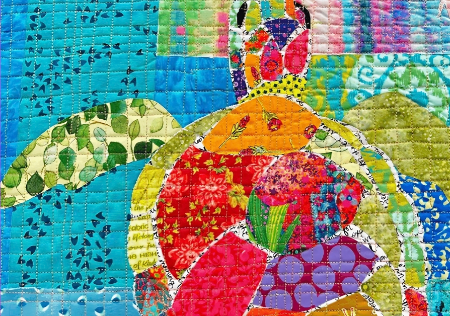 Seawell fabric collage by instructor Donna Galvan, featuring layered coastal fabrics in cool blue tones and textured textile artistry.
