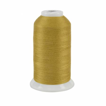 Spool of yellow thread on a white background