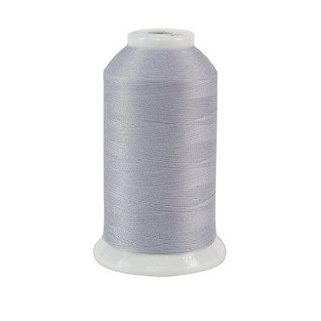 Spool of gray thread on a white background