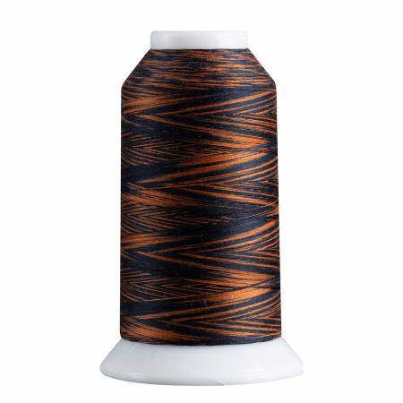 Spool of thread with black and orange pattern on a white background