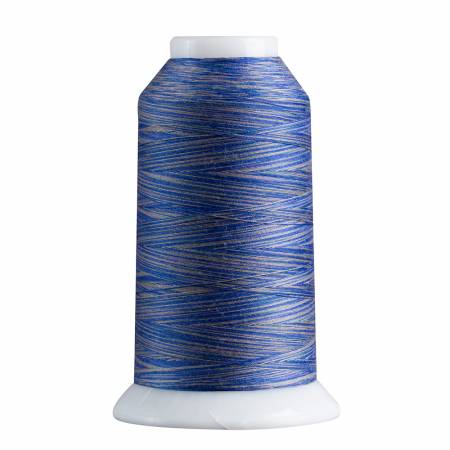 Spool of blue thread on a white background