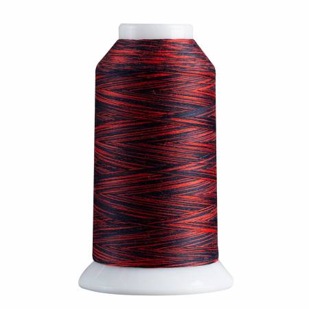 Spool of red and black thread on a white background