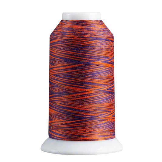 Spool of orange and purple thread on a white background
