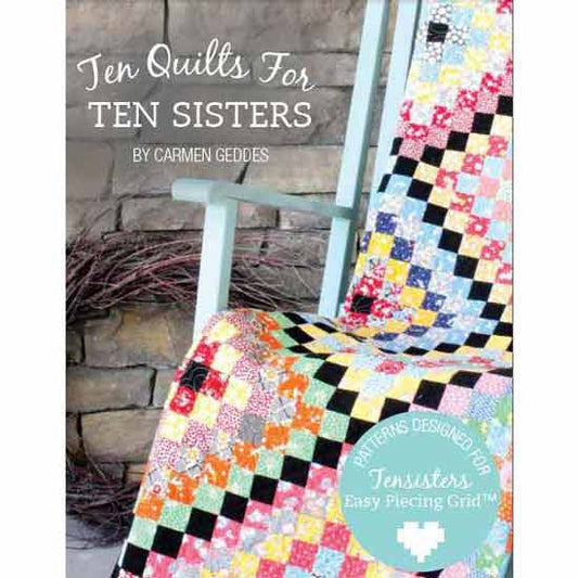 Colorful quilt draped over a chair with 'Ten Quilts For Ten Sisters' text and branding.