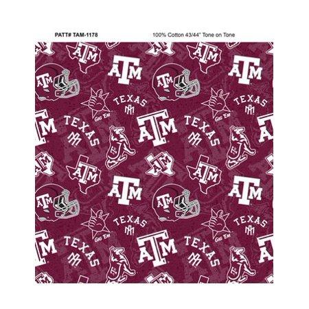 Cotton fabric with Texas A&M logos on a maroon background