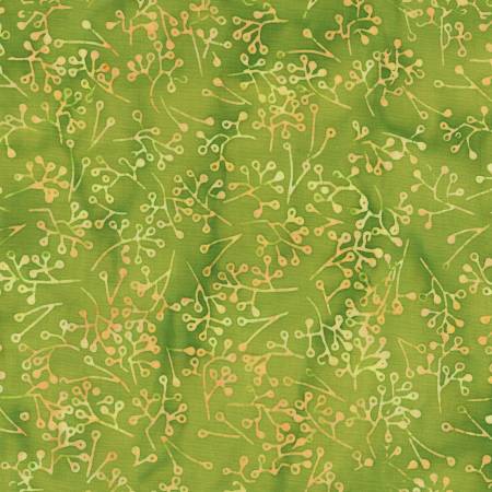 Green fabric with a subtle pattern of small white and orange elements