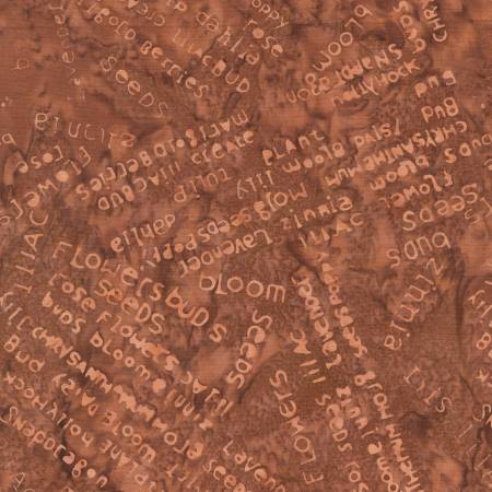 Textured brown surface with printed words and phrases.
