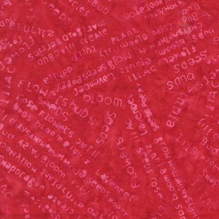 Red fabric with white text pattern on a red background