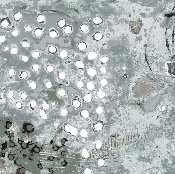 Close-up of a textured surface with circular patterns and white spots.