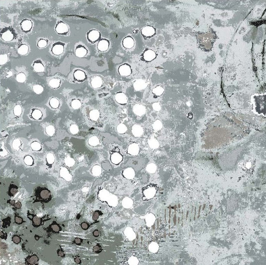 Close-up of a textured surface with circular patterns and white spots.